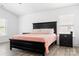 Spacious bedroom featuring a king size bed, hardwood floors, and ample natural light at 320 Allspice Rd, Fort Mill, SC 29708