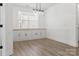 A dining room features ample natural light and built-in cabinetry, offering a bright and inviting space at 320 Allspice Rd, Fort Mill, SC 29708