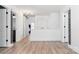 Bright hallway features wood-look floors, neutral paint, and access to multiple rooms at 320 Allspice Rd, Fort Mill, SC 29708