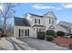 Two-story house with black shutters, white siding, and a manicured lawn at 3217 Deep Meadow Ln, Charlotte, NC 28210