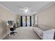 Spacious living room with a ceiling fan and carpet floors, perfect for entertaining and relaxation at 3217 Deep Meadow Ln, Charlotte, NC 28210