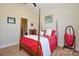 Comfortable bedroom featuring a four-poster bed, neutral colors, and ample natural light at 341 Canvasback Rd, Mooresville, NC 28117