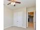 The bedroom offers built-in closet and a door leading to a kitchen area at 341 Canvasback Rd, Mooresville, NC 28117
