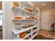 Inviting hallway with shelving, stylish decor, and hardwood floors at 341 Canvasback Rd, Mooresville, NC 28117