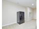 The kitchen shows a black refrigerator with a water dispenser on a light grey wall at 341 Canvasback Rd, Mooresville, NC 28117