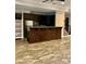 Modern kitchen features dark wood cabinets and stainless appliances at 341 Canvasback Rd, Mooresville, NC 28117