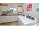 Well-equipped laundry room featuring front load washer and dryer, plus ample storage at 341 Canvasback Rd, Mooresville, NC 28117