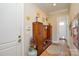 Mudroom with custom built-in storage and tile flooring at 341 Canvasback Rd, Mooresville, NC 28117