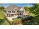 Stunning backyard with private pool, screened-in porch, and lush landscaping at 341 Canvasback Rd, Mooresville, NC 28117