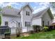 The home features a spacious wooden deck perfect for enjoying the lush backyard views at 3905 Farlow Rd, Charlotte, NC 28269