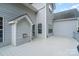 The home features a spacious wooden deck with access to the backyard at 3905 Farlow Rd, Charlotte, NC 28269