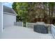 The home features a wooden deck with a grill and a view of the yard at 3905 Farlow Rd, Charlotte, NC 28269