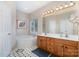 Bathroom with soaking tub, double vanity, and neutral decor at 3905 Farlow Rd, Charlotte, NC 28269