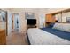 Cozy bedroom featuring plush carpet, entertainment center and natural light at 3905 Farlow Rd, Charlotte, NC 28269