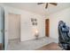 A clean and simple bedroom with gray carpeting, and lots of light at 3905 Farlow Rd, Charlotte, NC 28269
