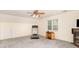 Spacious bonus room with neutral carpet and a ceiling fan at 3905 Farlow Rd, Charlotte, NC 28269