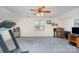 Bright bonus room featuring neutral paint, cozy carpeting and a treadmill at 3905 Farlow Rd, Charlotte, NC 28269