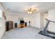 Spacious bonus room with cozy carpeting, and large window at 3905 Farlow Rd, Charlotte, NC 28269