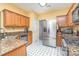 Modern kitchen featuring stainless steel appliances and granite countertops at 3905 Farlow Rd, Charlotte, NC 28269
