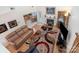 Open-concept living room featuring hardwood floors, fireplace, and seamless flow into the kitchen at 3905 Farlow Rd, Charlotte, NC 28269