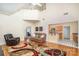 Spacious living room with high ceilings, hardwood floors, and comfortable seating area at 3905 Farlow Rd, Charlotte, NC 28269