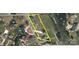 Aerial view of property lines showing a large lot near the lake and other houses in the neighborhood at 421 Tranquil Bay Cir, Norwood, NC 28128