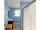 Bathroom with a large tiled shower and a modern vanity at 421 Tranquil Bay Cir, Norwood, NC 28128
