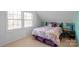 Cozy bedroom features a large window and comfortable furnishings at 421 Tranquil Bay Cir, Norwood, NC 28128