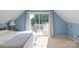 Bedroom showcasing access to a private balcony with outdoor seating at 421 Tranquil Bay Cir, Norwood, NC 28128