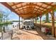 Covered boat dock equipped with a boat lift, offering easy access to the water and waterfront relaxation at 421 Tranquil Bay Cir, Norwood, NC 28128