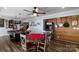 Entertaining game room with pool table, arcade machine, and guitar decor at 421 Tranquil Bay Cir, Norwood, NC 28128