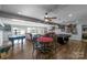 Expansive living room with pool tables and a sitting area at 421 Tranquil Bay Cir, Norwood, NC 28128
