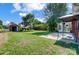 Spacious backyard features a shed, brick home, patio, and well-maintained lawn at 4302 Ethel Sustar Dr, Monroe, NC 28110