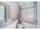Cozy bathroom showcasing a shower-tub combo with matching vanity and mirror at 4302 Ethel Sustar Dr, Monroe, NC 28110