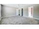 This bedroom offers neutral paint, plush carpet, and a ceiling fan at 4302 Ethel Sustar Dr, Monroe, NC 28110
