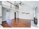 Spacious living room shows wood floors, vaulted ceilings, and a view to the second floor at 4302 Ethel Sustar Dr, Monroe, NC 28110