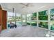 Bright sunroom with many large windows and tile flooring at 4302 Ethel Sustar Dr, Monroe, NC 28110