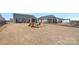 Wide backyard view of a playset and patio, offering outdoor enjoyment at 4318 Greenleaf Nw St, Concord, NC 28027