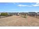 Spacious backyard with a playset, black fence, and clear blue sky at 4318 Greenleaf Nw St, Concord, NC 28027