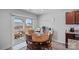 Cozy dining area with a round table and access to a patio, perfect for outdoor dining at 4318 Greenleaf Nw St, Concord, NC 28027