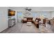 Spacious living room with hardwood floors, a large sectional sofa, and plenty of natural light at 4318 Greenleaf Nw St, Concord, NC 28027