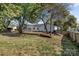 Backyard view with a wood fence and landscaping at 4515 Country Meadows Dr, Gastonia, NC 28056