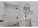 Bathroom featuring modern vanity and bathtub with shower at 4515 Country Meadows Dr, Gastonia, NC 28056
