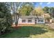 A full view of the home showing its placement on the lot and attractive landscaping at 4515 Country Meadows Dr, Gastonia, NC 28056