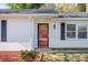 Close up of the front door and windows showing exterior finishes and design at 4515 Country Meadows Dr, Gastonia, NC 28056