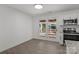 Bright kitchen features stainless appliances and French doors to a brick patio at 4515 Country Meadows Dr, Gastonia, NC 28056