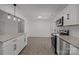 Modern kitchen features stainless steel appliances, granite countertops, island and open floorplan at 4515 Country Meadows Dr, Gastonia, NC 28056