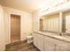 Bathroom with double vanity, granite countertop, and tiled floors at 4852 Stone Dr, Conover, NC 28613