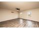 Comfortable bedroom featuring a ceiling fan, hardwood floors, and double windows for natural light at 4852 Stone Dr, Conover, NC 28613