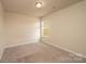 Bedroom featuring carpet and natural light from the single window at 4852 Stone Dr, Conover, NC 28613